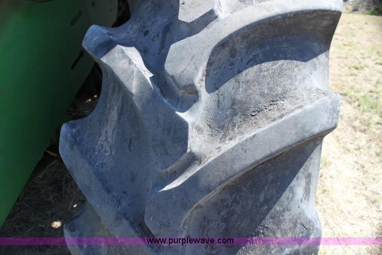 image for item H7320 1987 John Deere 7720 Titan II RWA combine