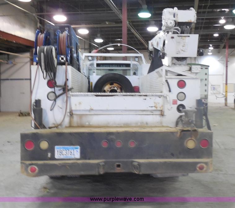 image for item I1490 1999 GMC C7500 service truck