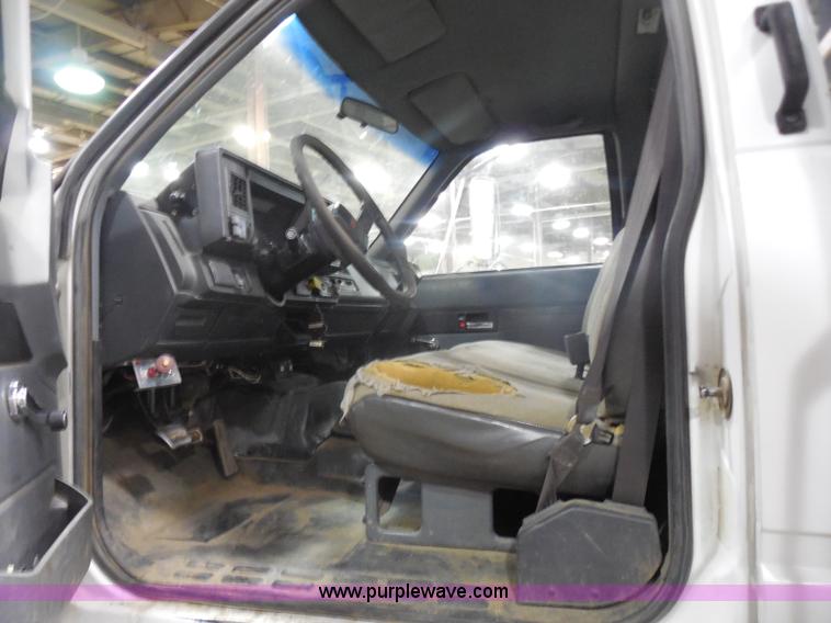 image for item I1490 1999 GMC C7500 service truck