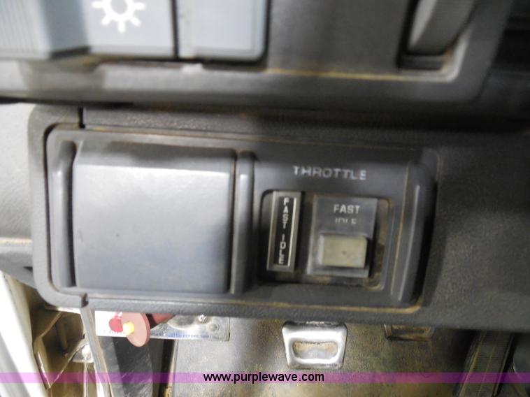 image for item I1490 1999 GMC C7500 service truck