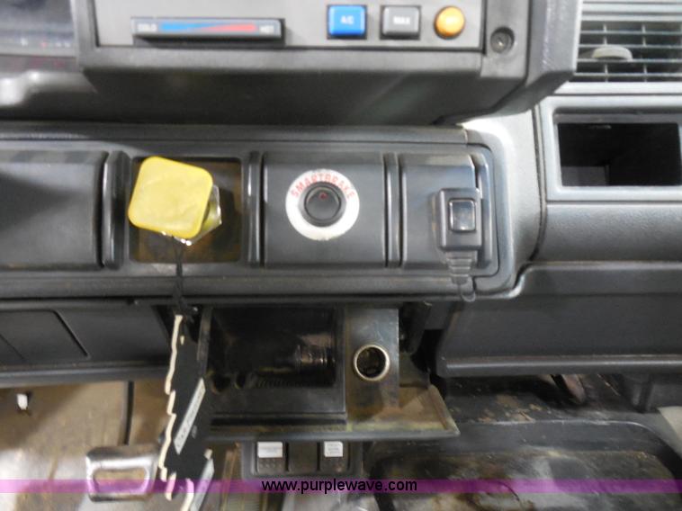 image for item I1490 1999 GMC C7500 service truck