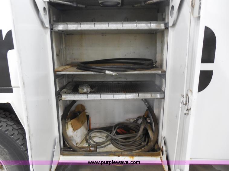 image for item I1490 1999 GMC C7500 service truck