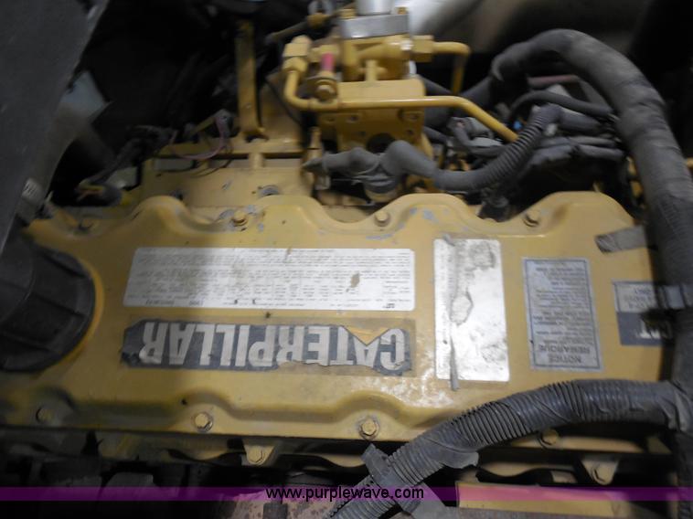 image for item I1490 1999 GMC C7500 service truck