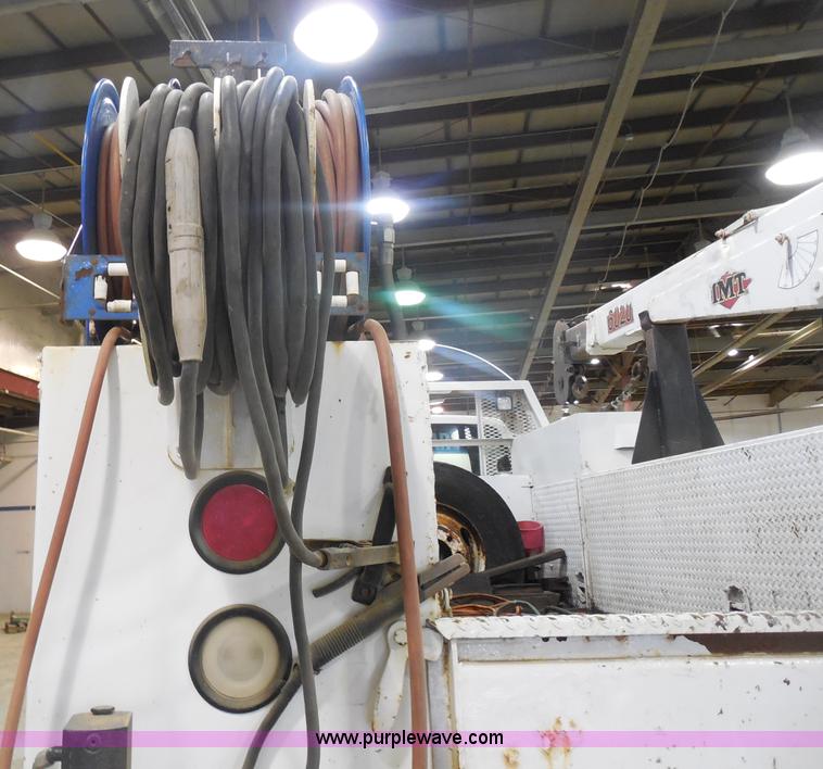 image for item I1490 1999 GMC C7500 service truck