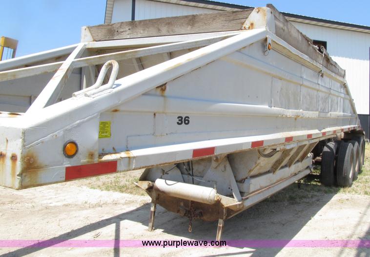 image for item D7441 1972 Cook tri axle belly dump trailer