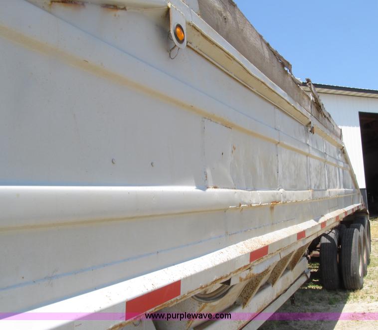 image for item D7441 1972 Cook tri axle belly dump trailer