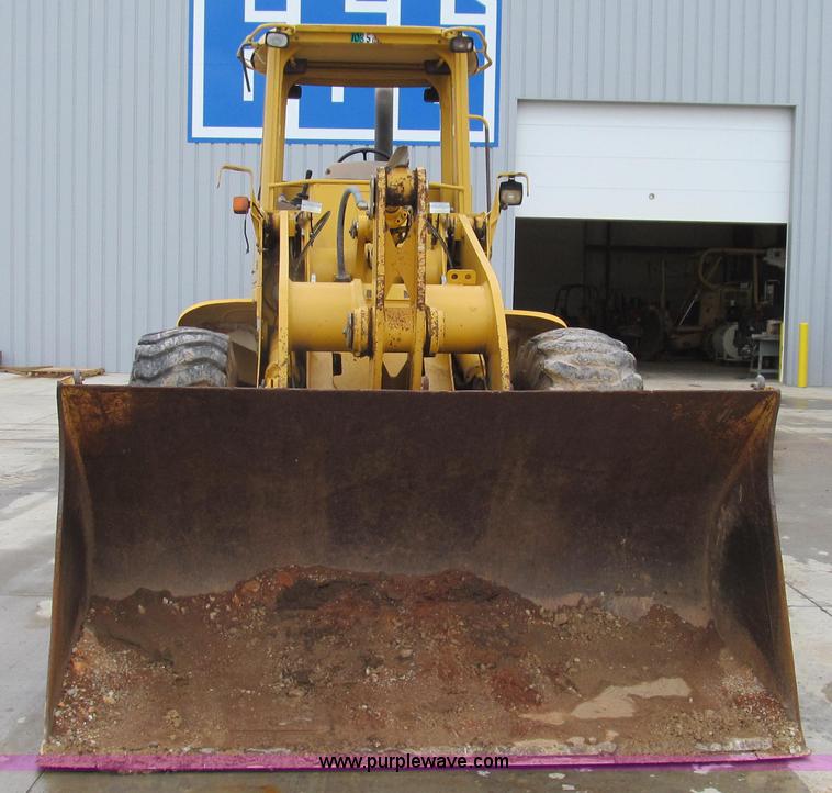 image for item E3937 1999 John Deere 624H loader