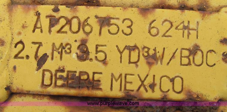 image for item E3937 1999 John Deere 624H loader