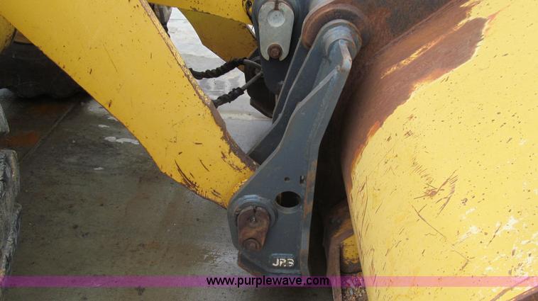 image for item E3937 1999 John Deere 624H loader