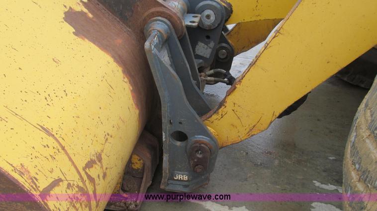 image for item E3937 1999 John Deere 624H loader