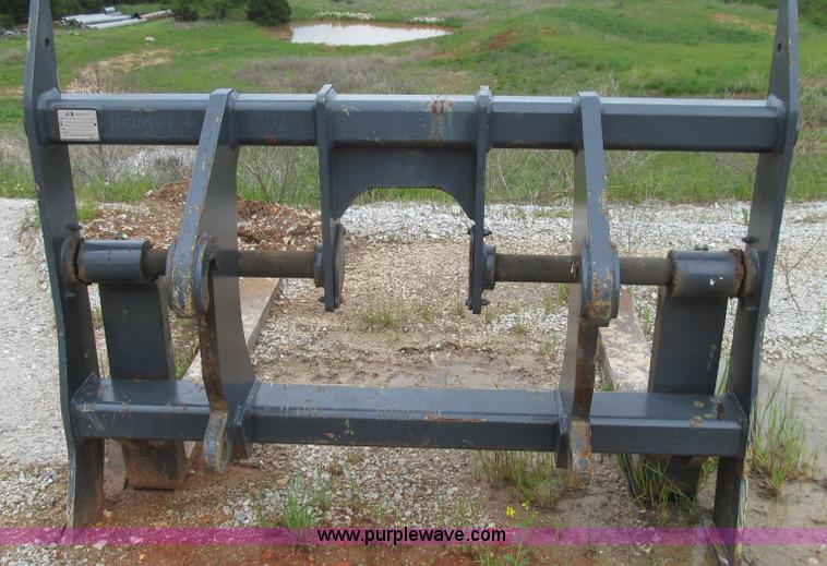 image for item E3937 1999 John Deere 624H loader