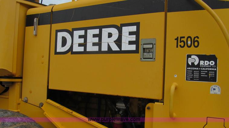 image for item E3937 1999 John Deere 624H loader