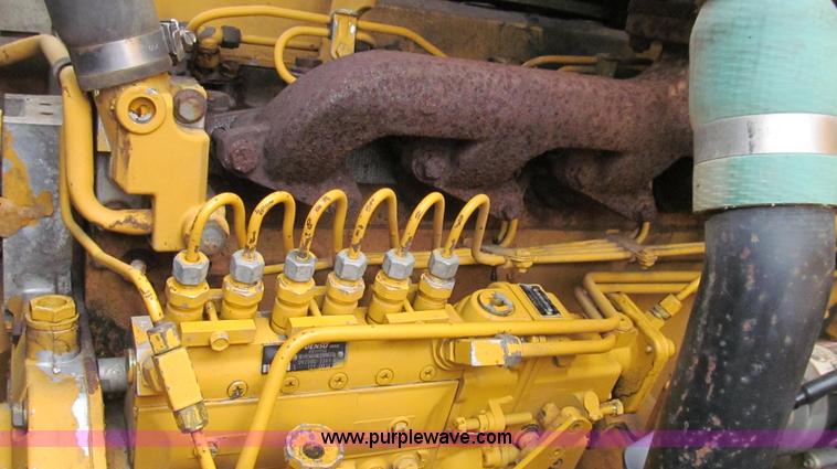 image for item E3937 1999 John Deere 624H loader