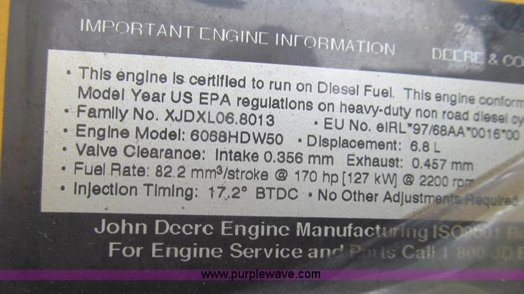 image for item E3937 1999 John Deere 624H loader