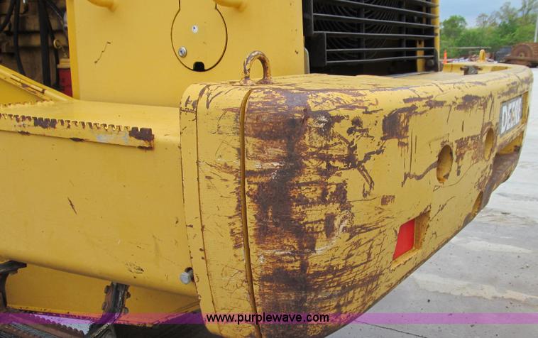 image for item E3937 1999 John Deere 624H loader