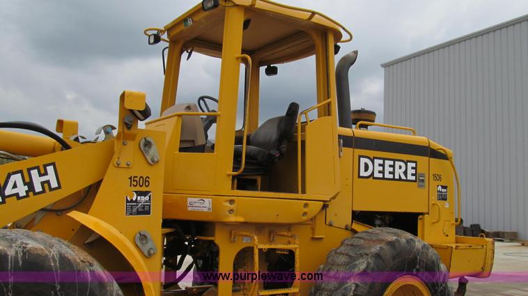 image for item E3937 1999 John Deere 624H loader