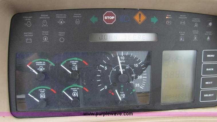 image for item E3937 1999 John Deere 624H loader