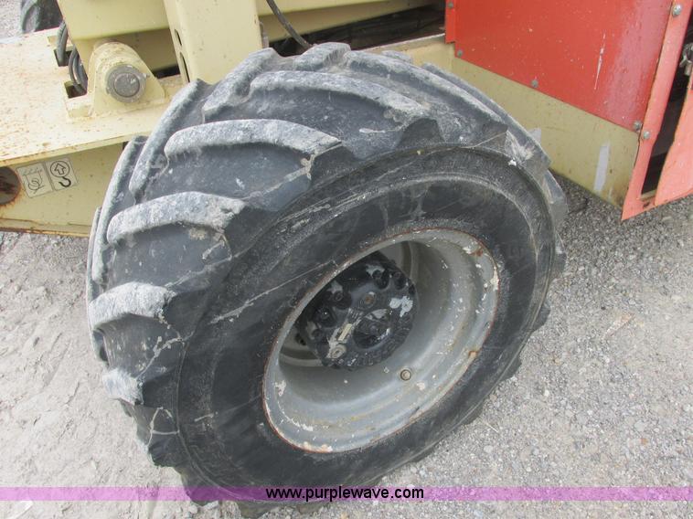 image for item E7336 2002 JLG 33RTS scissor lift