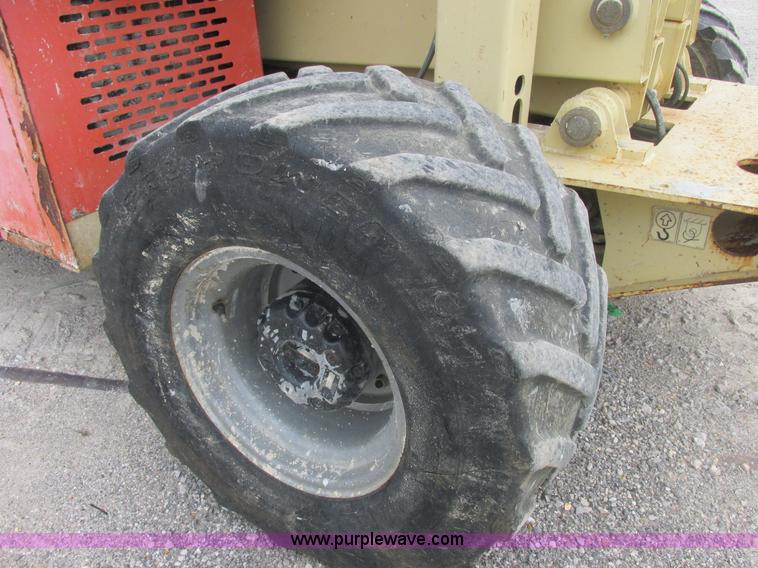 image for item E7336 2002 JLG 33RTS scissor lift