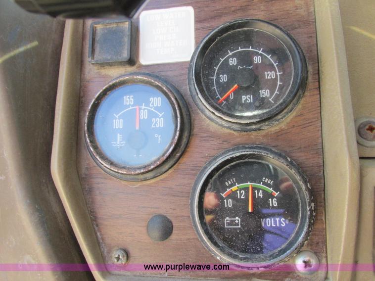 image for item F5220 1985 Mack DM685S drywall boom truck