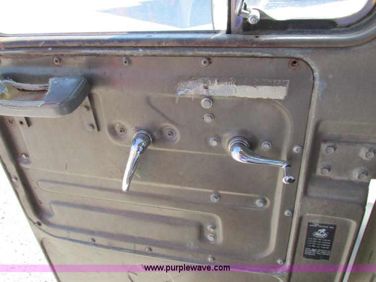 image for item F5220 1985 Mack DM685S drywall boom truck