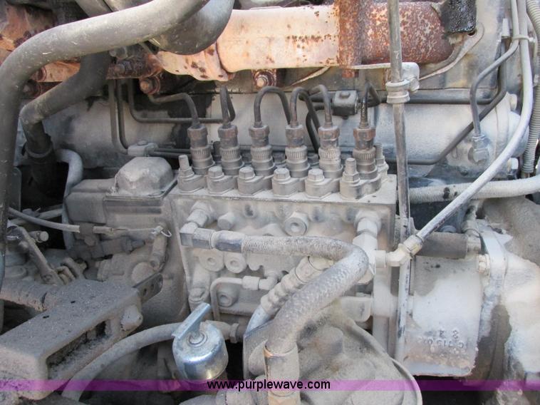 image for item F5220 1985 Mack DM685S drywall boom truck