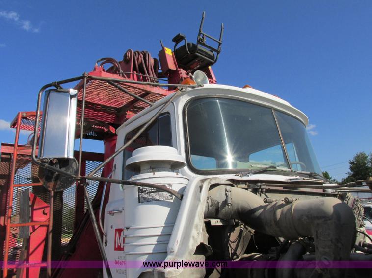 image for item F5220 1985 Mack DM685S drywall boom truck