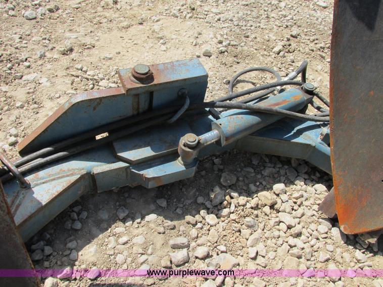 image for item F5225 Care Tree 636 36" skid steer tree spade