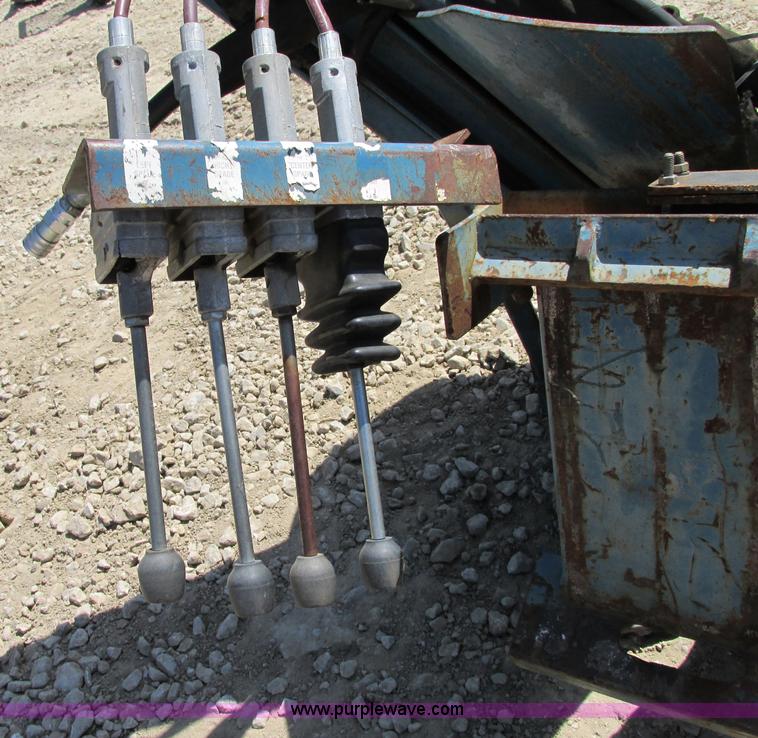 image for item F5225 Care Tree 636 36" skid steer tree spade