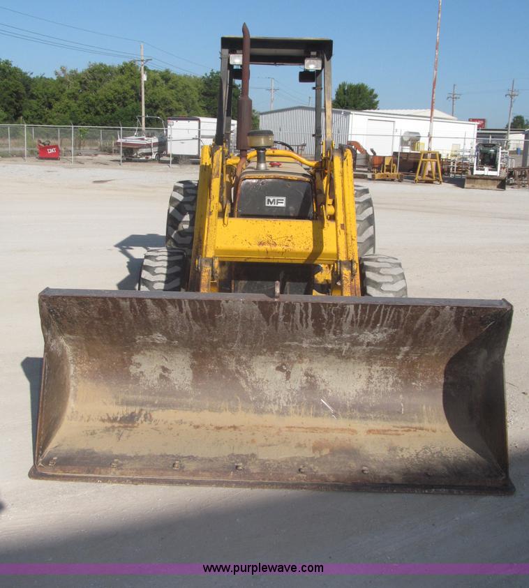 image for item F7106 1994 Massey-Ferguson 50EX Power Shuttle L MFWD tractor