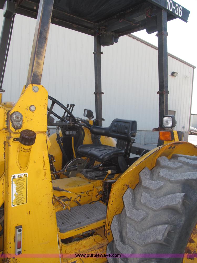 image for item F7106 1994 Massey-Ferguson 50EX Power Shuttle L MFWD tractor