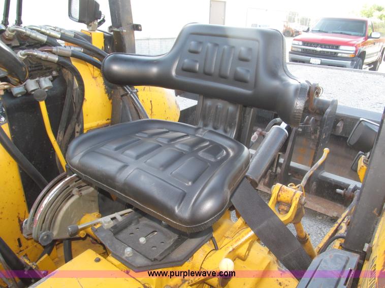 image for item F7106 1994 Massey-Ferguson 50EX Power Shuttle L MFWD tractor