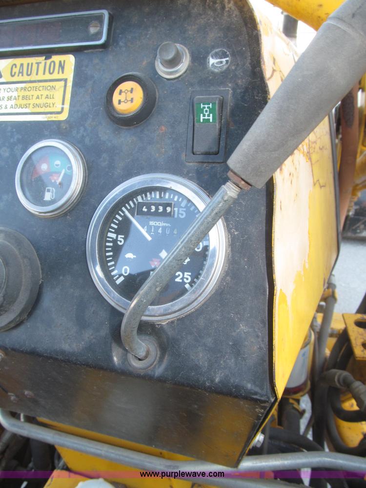 image for item F7106 1994 Massey-Ferguson 50EX Power Shuttle L MFWD tractor