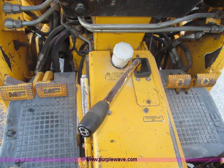 image for item F7106 1994 Massey-Ferguson 50EX Power Shuttle L MFWD tractor