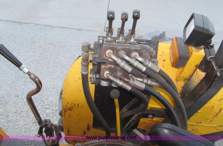 image for item F7106 1994 Massey-Ferguson 50EX Power Shuttle L MFWD tractor