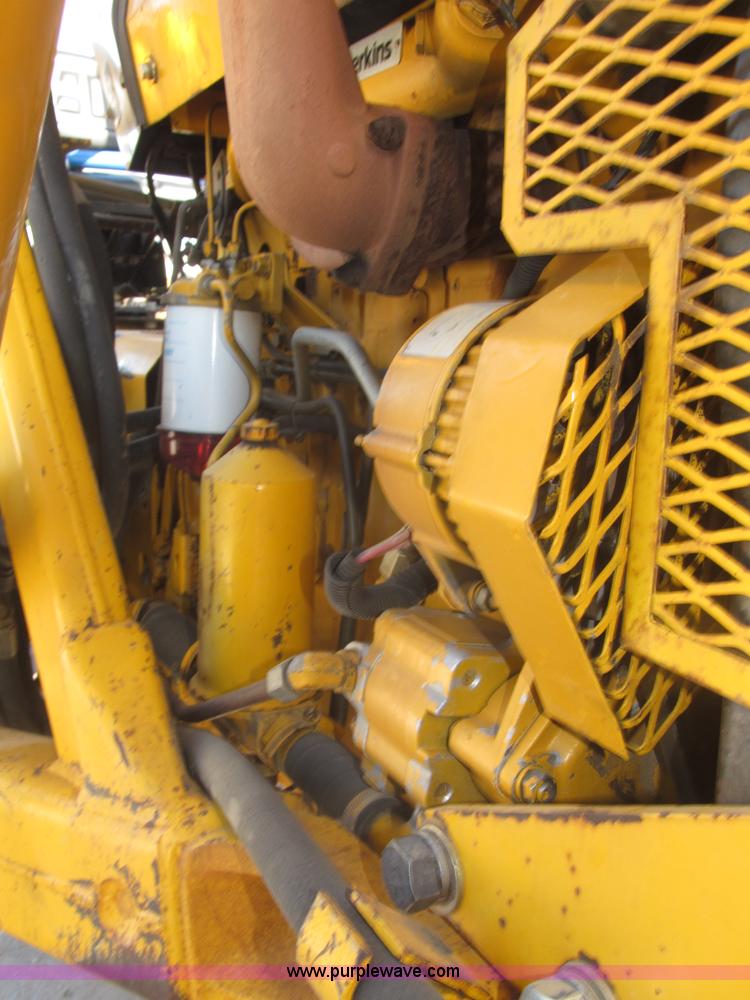 image for item F7106 1994 Massey-Ferguson 50EX Power Shuttle L MFWD tractor