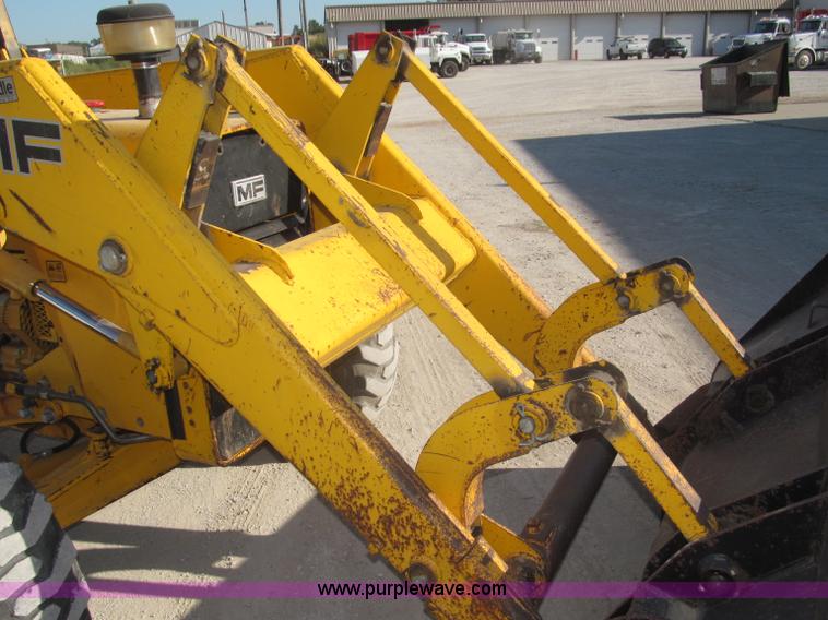 image for item F7106 1994 Massey-Ferguson 50EX Power Shuttle L MFWD tractor