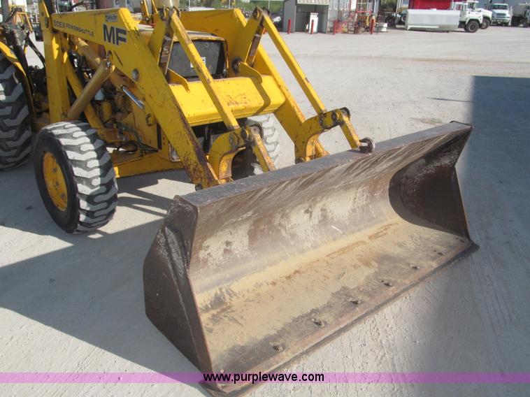 image for item F7106 1994 Massey-Ferguson 50EX Power Shuttle L MFWD tractor