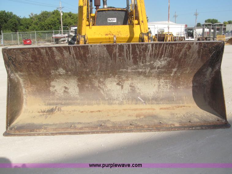 image for item F7106 1994 Massey-Ferguson 50EX Power Shuttle L MFWD tractor