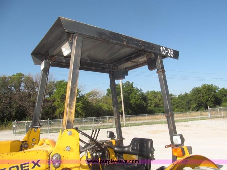 image for item F7106 1994 Massey-Ferguson 50EX Power Shuttle L MFWD tractor