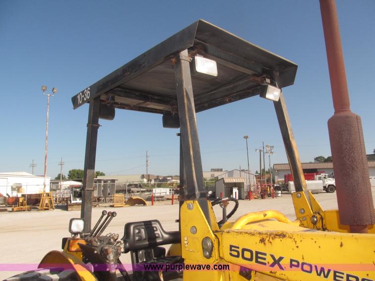 image for item F7106 1994 Massey-Ferguson 50EX Power Shuttle L MFWD tractor