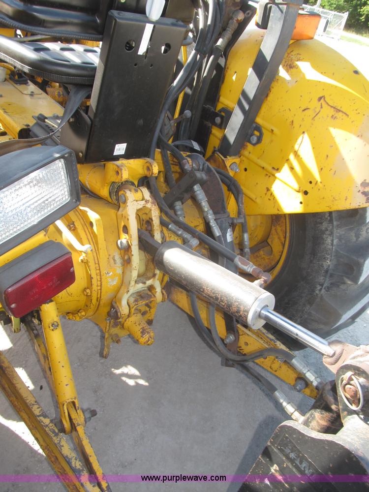 image for item F7106 1994 Massey-Ferguson 50EX Power Shuttle L MFWD tractor