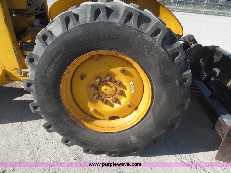 image for item F7106 1994 Massey-Ferguson 50EX Power Shuttle L MFWD tractor