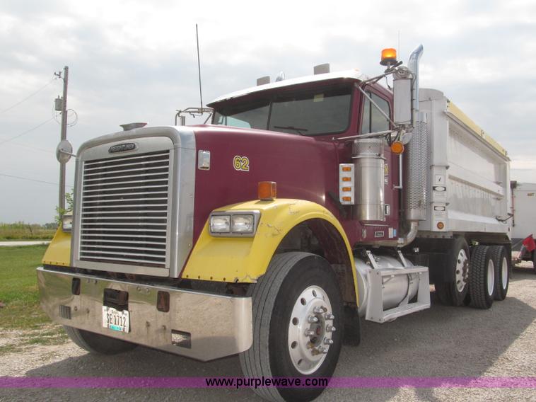 image for item F7111 2000 Freightliner FLD120SD tri axle dump truck