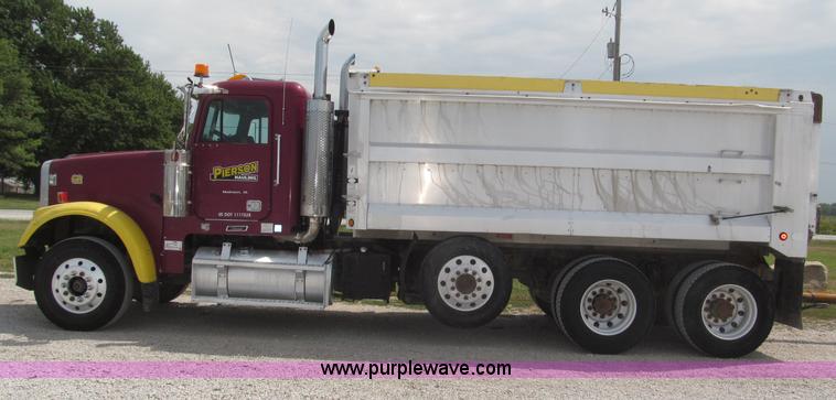image for item F7111 2000 Freightliner FLD120SD tri axle dump truck
