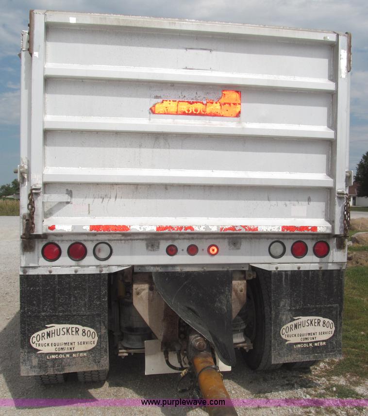 image for item F7111 2000 Freightliner FLD120SD tri axle dump truck