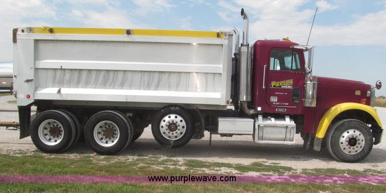 image for item F7111 2000 Freightliner FLD120SD tri axle dump truck