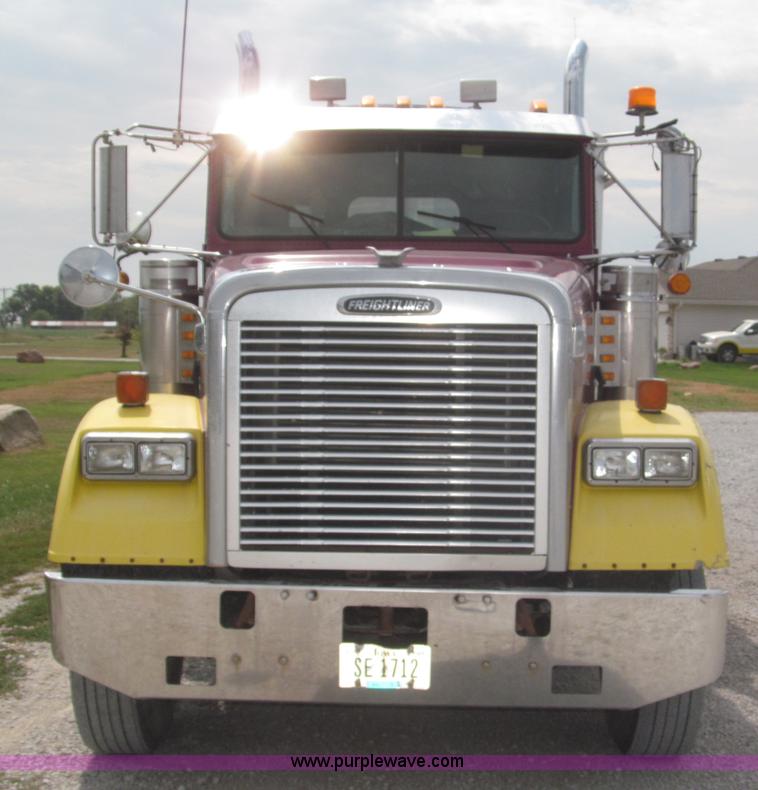 image for item F7111 2000 Freightliner FLD120SD tri axle dump truck