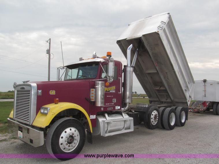 image for item F7111 2000 Freightliner FLD120SD tri axle dump truck