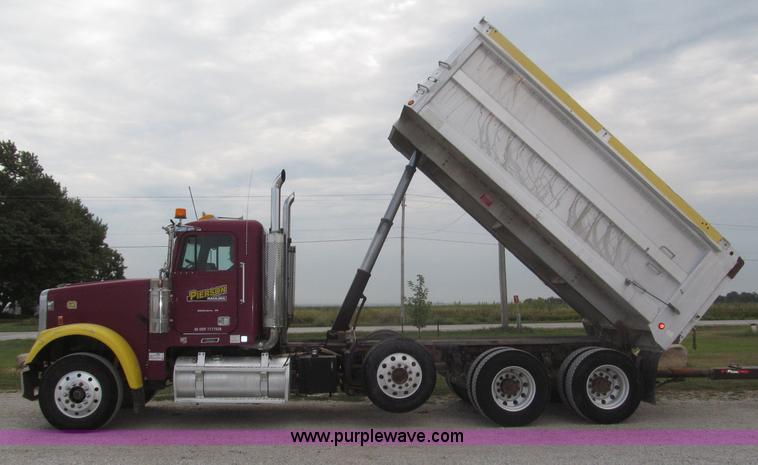 image for item F7111 2000 Freightliner FLD120SD tri axle dump truck